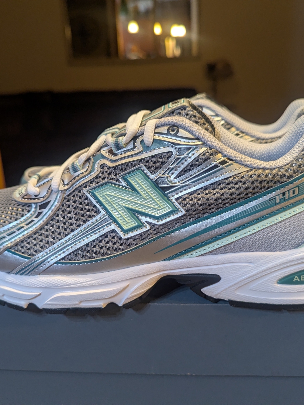 New Balance Women's Athletic Sneakers in Gray with Teal Accents